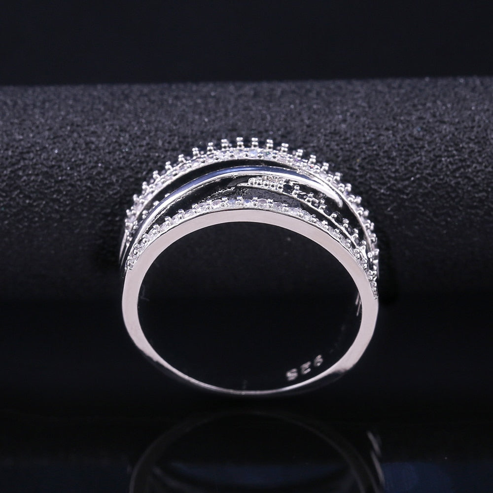 Fashion Jewelry Elegant Winding Puzzle Ring for Women with Zircon in Silver Color