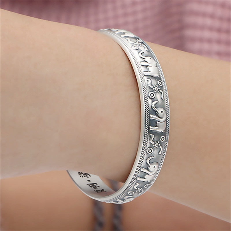 Silver cuff 2024 bracelet with elephant engraved