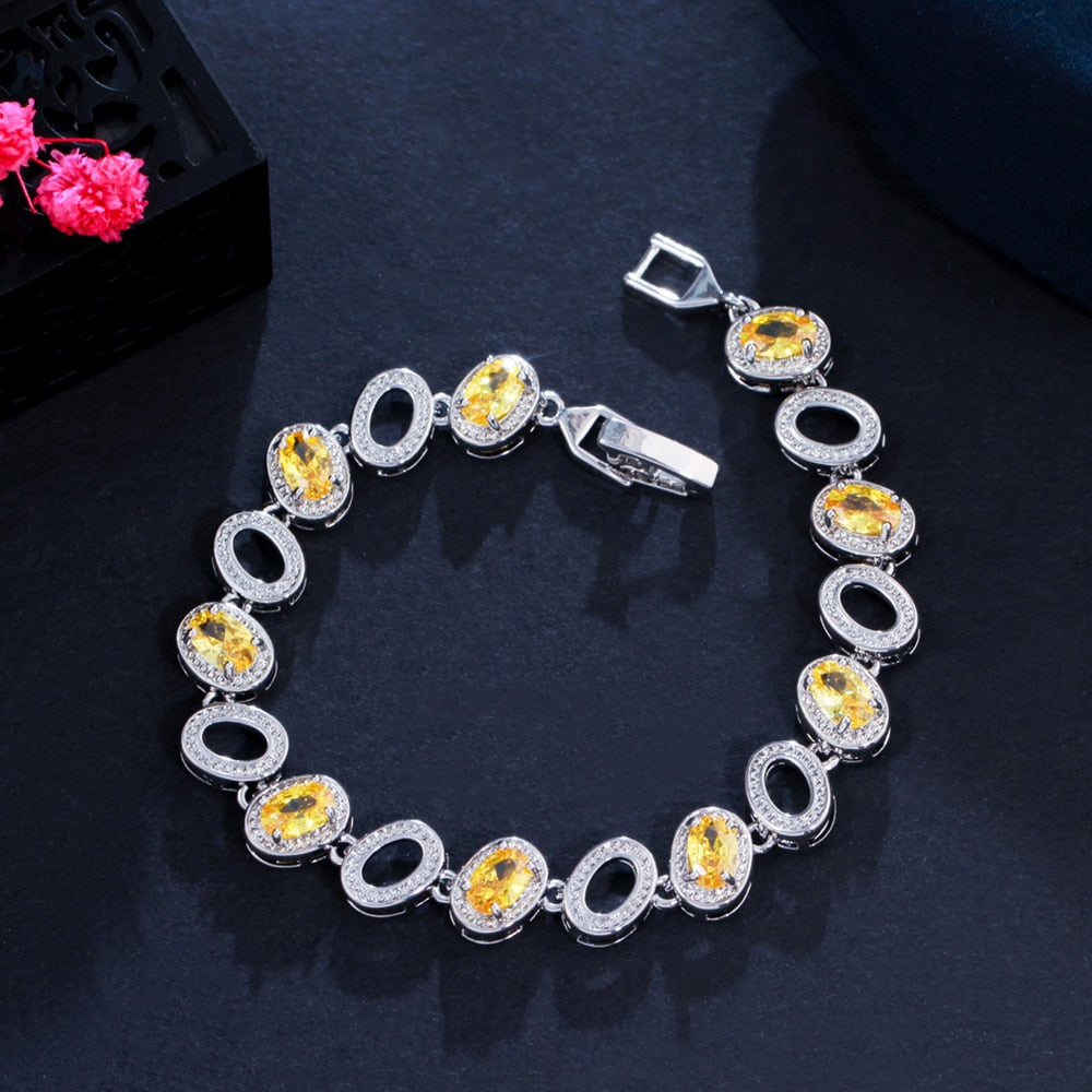 Luxury Jewelry Oval Crystal Bangle Bracelet for a Friend with Yellow Zircon in Silver Color